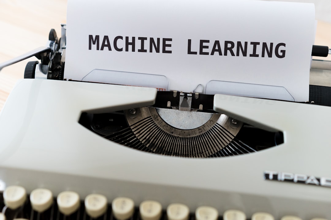 a-close-up-of-a-typewriter-with-a-paper-reading-machine-learning-f57lx37dcm4